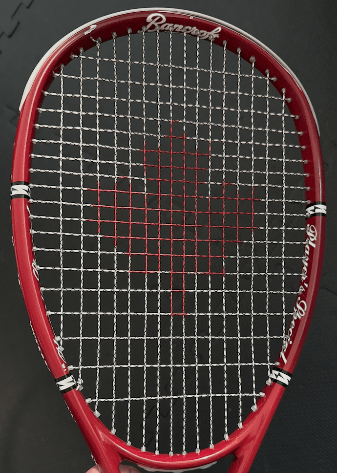 Red squash racquet with a red print centred on white strings